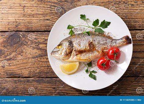 Plate Of Baked Fish With Vegetables Stock Image Image Of Fried