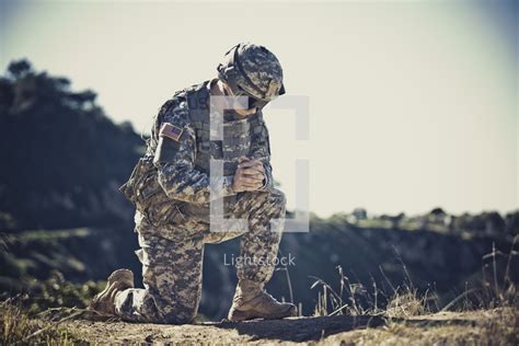 Stock Photo - Soldier kneeling in prayer by Forgiven Photography ...