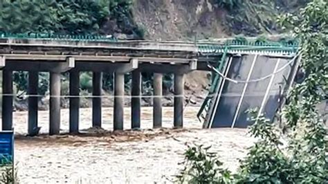 11 Killed in China Bridge Collapse Due to Torrential Rains