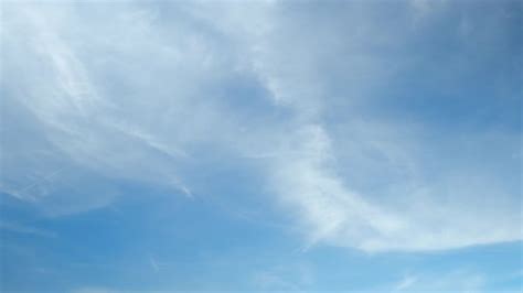 4K Time lapse of beautiful blue sky with clouds background, Blue sky ...