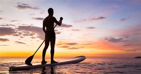 The History Of Paddle Boarding Watersports Bay