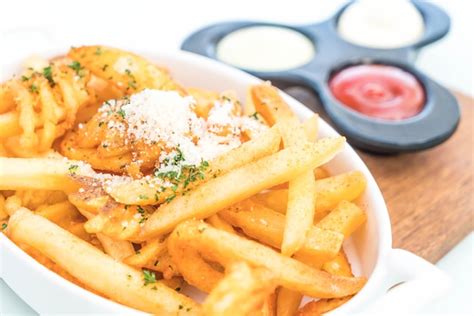 Premium Photo | French fries with dipping sauce