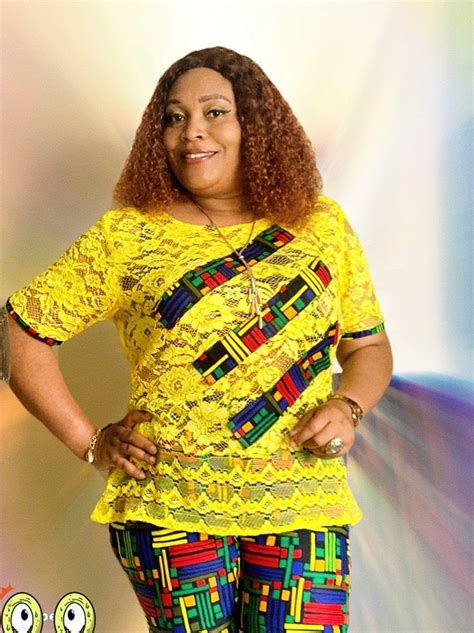 A Woman In Yellow Shirt And Colorful Pants