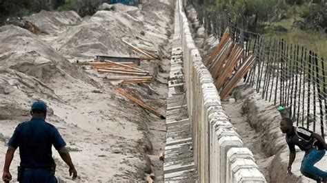 South Africa resumes building wall along border with Mozambique