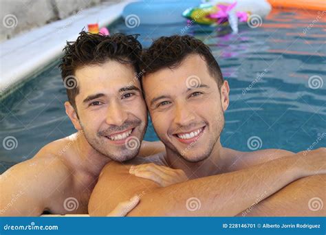 Gorgeous Interracial Gay Couple In Swimming Pool Stock Image Image Of Hispanic Couple
