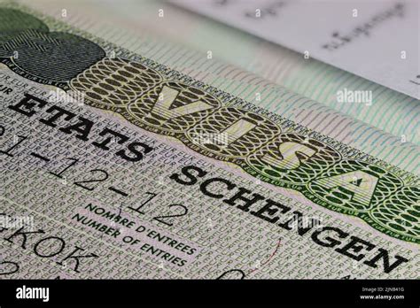 Schengen States visa in passport Stock Photo - Alamy