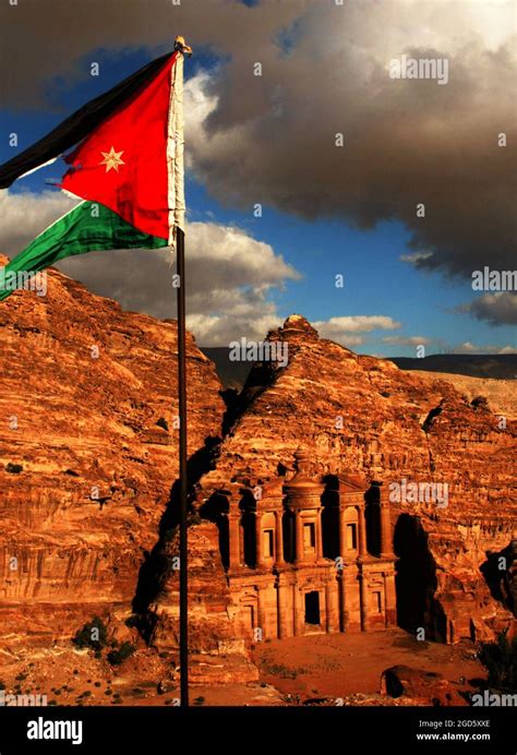 Flag Of Jordan Over The Petra Monastery Stock Photo Alamy