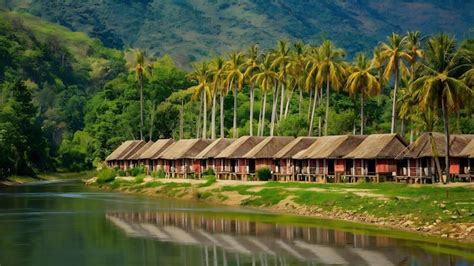 Premium Photo Village And Bungalows Along Nam Song River In Vang