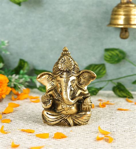 Buy Blessing Ganesh Gold Brass Idol at 6% OFF by Imli street | Pepperfry