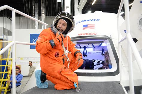 Spacesuited Astronauts Climb Aboard Boeing Cst 100 Commercial Crew