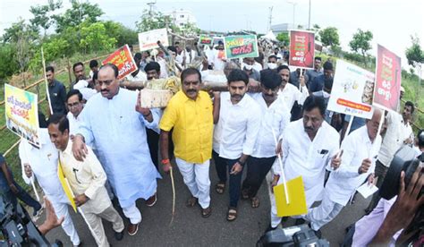 Tdp Protest Rally Of Tdp Mlas To The Assembly Carrying A Heavy Cart