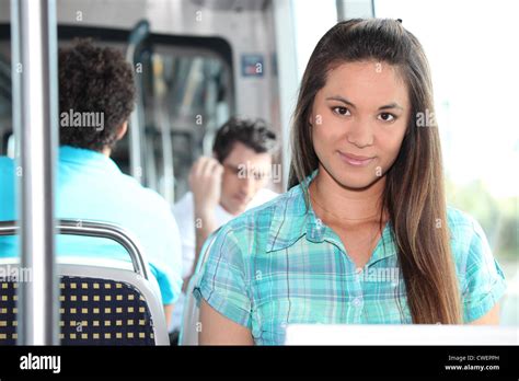 Brunette Riding On Tram Stock Photo Alamy