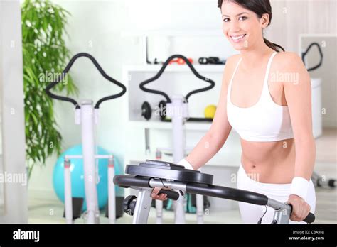 Brunette Having Exercise In Gym Stock Photo Alamy