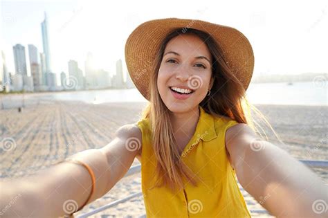 Self Portrait Of Beautiful Young Lady On The Beach At Sunset Selfie Of Authentic People