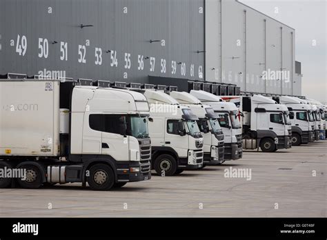 Aldi Bolton Distradution centre exterior loading bays with trucks Stock Photo - Alamy