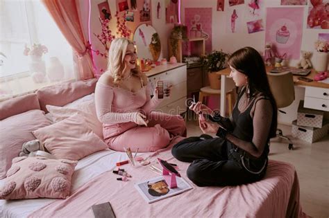 Brunette Girl Looking At Her Sister With Eyeshadow Pallet Stock Image Image Of Subculture