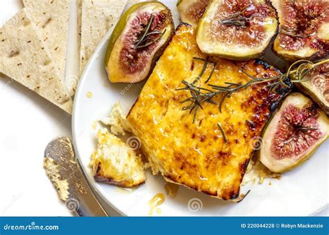 Baked Feta Cheese With Honey And Rosemary With Roasted Figs Top View