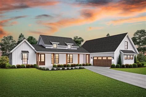 3 Bed Modern Farmhouse Plan With 2 Car Courtyard Entry Garage Floor