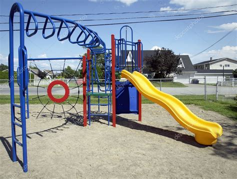 Yellow Slide At The Playground — Stock Photo © Mirage3 6158479