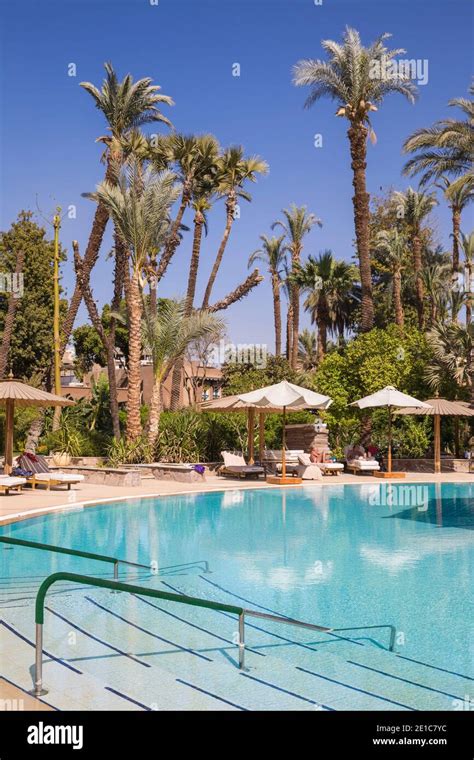 Egypt, Luxor, Swimming pool in the Garden at the The Winter Palace ...