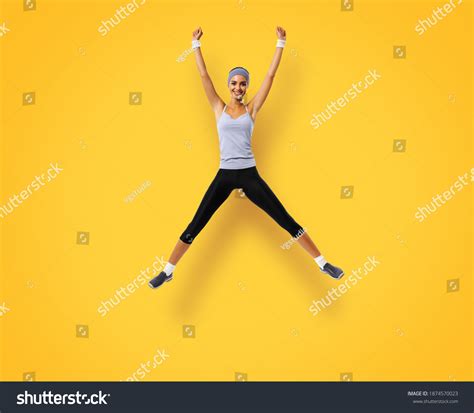 Full Body Happy Excited Woman Jumping Stock Photo 1874570023 Shutterstock