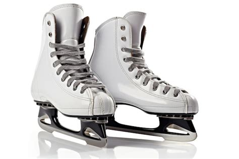 Premium Photo Pair Of Professional Figure Ice Skates Leaning Close Up And Isolated On White