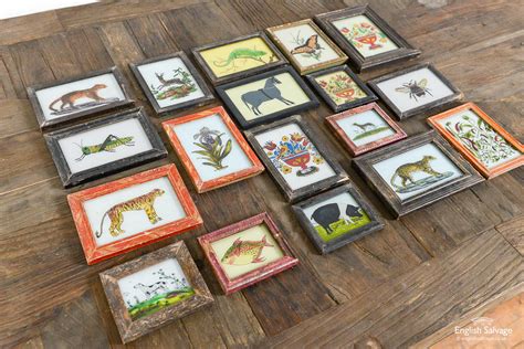 Smaller framed glass paintings of animals