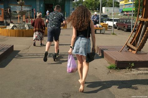 A Barefoot Brunette In A Mini Skirt Part City Feet Full HD MP