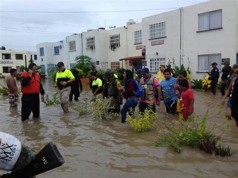 Al Menos Personas Atrapadas Tras Desbordamiento De R O En El Sur De