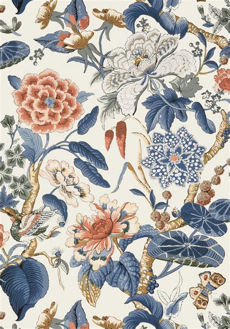 A Floral Wallpaper With Blue Leaves And Flowers