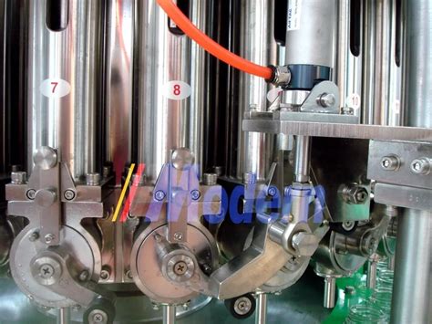 Automatic Rotary Type Edible Oil Filling Machine MODERN MACHINERY