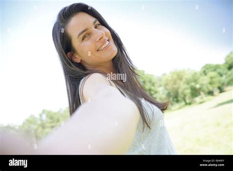 Portrait Of Smiling Beautiful Brunette Woman Stock Photo Alamy