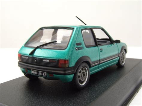 Modellauto Peugeot 205 GTi Griffe 1990 grün metallic 1 43 Norev bei