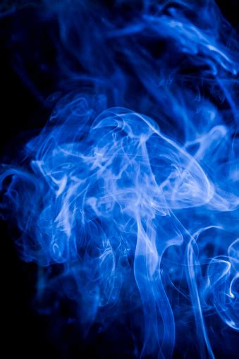 Blue Toxic Fumes Movement On A Black Background Stock Photo Download