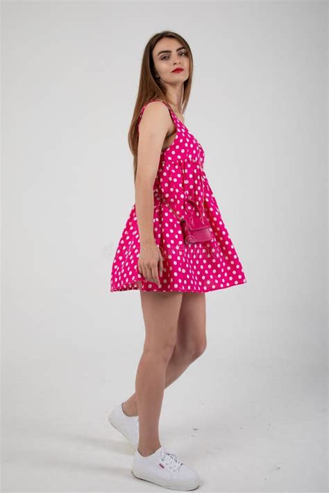 Stunning Model Posing In A Pink Polka Dot Mini Dress Stock Photo Image Of Blonde Stylish