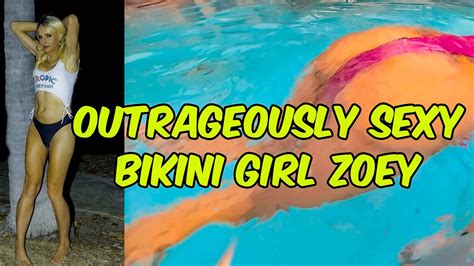 Outrageously Sexy Bikini Woman Swimming In The Tropics