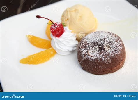 Chocolate Lava Cake with Ice Cream Stock Photo - Image of bokeh, berry ...