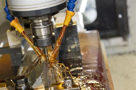 The Cnc Milling Machine Cutting The Mold Parts With Oil Coolant Method