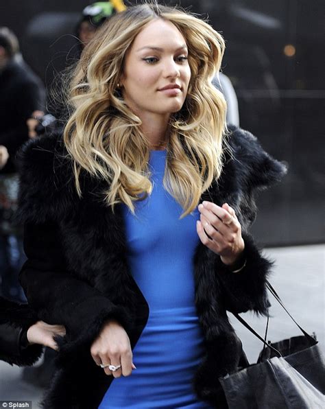 Candice Swanepoel Frolics Around The Beach In A Bikini While Trying Her Hand At The Drums