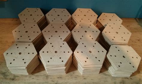 Several Pieces Of Unfinished Wood Sitting On Top Of A Wooden Table Next