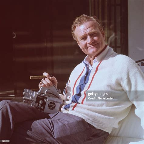 Portrait Of American Comedian Red Skelton Smiling While Sitting