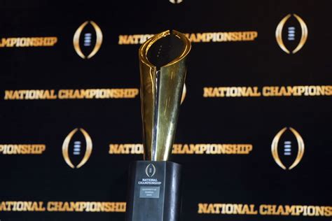 Rival College Football Fans Caught Hoisting CFP Championship Trophy