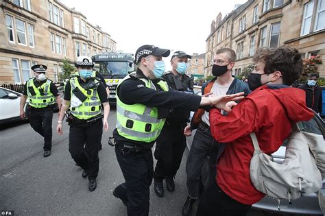 Hundreds Of Protesters Lie Under Home Office Van To Block Immigration