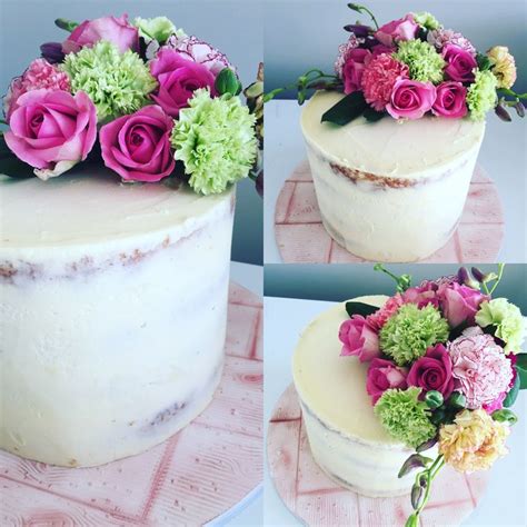 Semi Naked Vanilla Cake With Raspberry Coulis And White Chocolate Buttercream Topped With Fresh