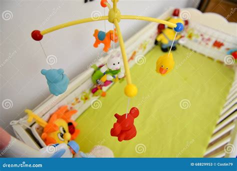 Baby Cot With Colorful Toys Hanging Stock Image Image Of Child