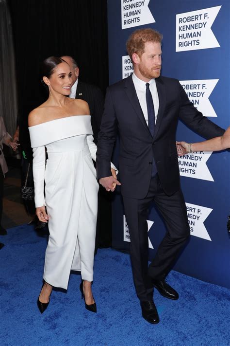 Meghan Markle And Prince Harry Sweetly Hold Hands In Rare Red Carpet