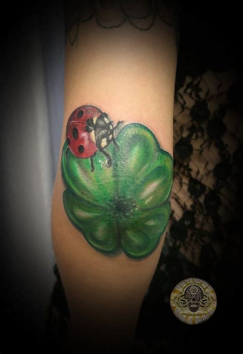 Clover With Ladybug Tattoo On Elbow Tattoos Book 65000 Tattoos