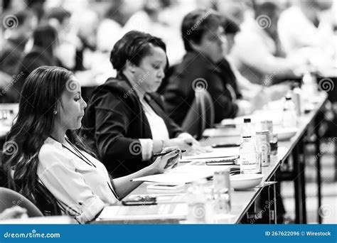 Delegates Attending a Sales Convention in Large Conference Hall ...