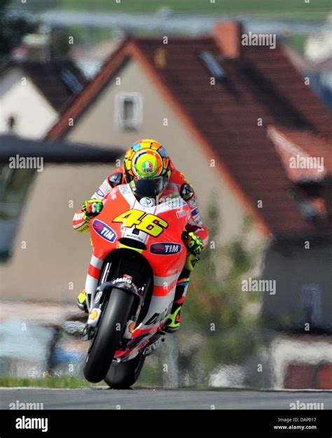 The Italian Ducati Driver Valentino Rossi Drives His Motorcycle In A