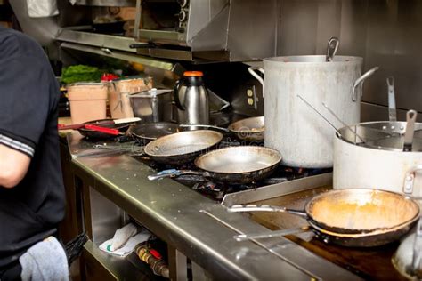 Busy restaurant kitchen stock photo. Image of organized - 239060664